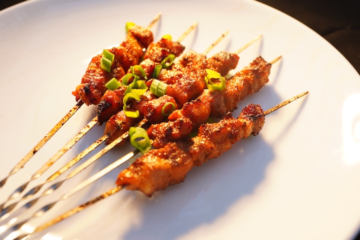 Caramelized pork belly skewers